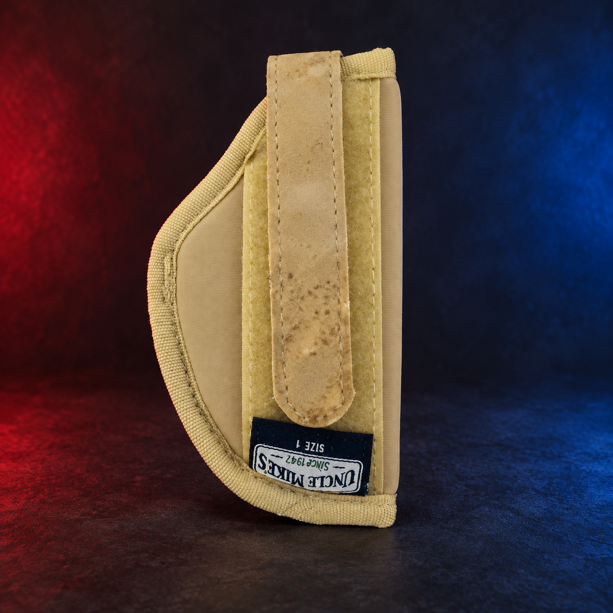 Uncle Mike’s beige body armor holster size 1, reverse showing discoloration